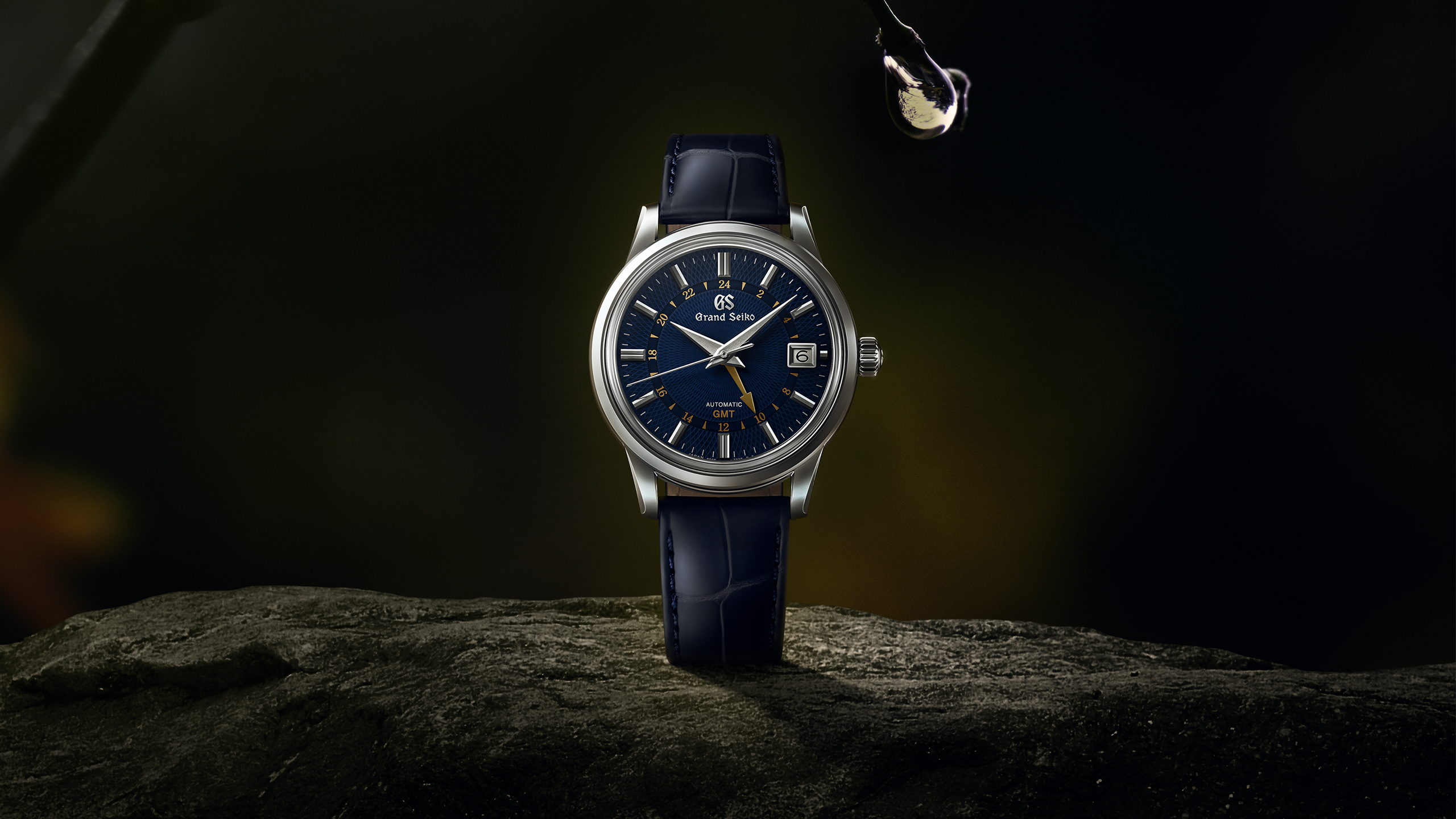 Frozen waterfall Jily Su in winter. Landscape of mountains with Grand_Seiko_Spring_Drive_GMT_SBG295-hero-thumbnail